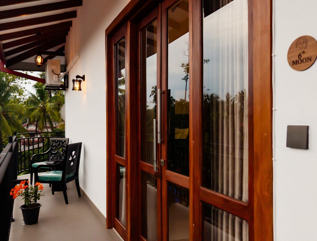 Private balcony with seating and garden view