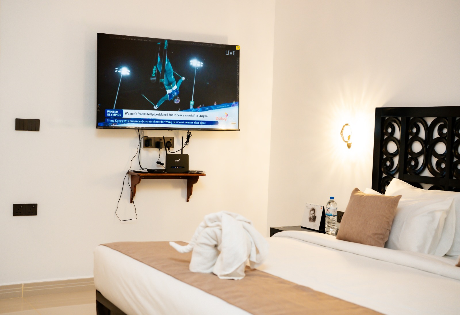 Room interior with wall-mounted TV