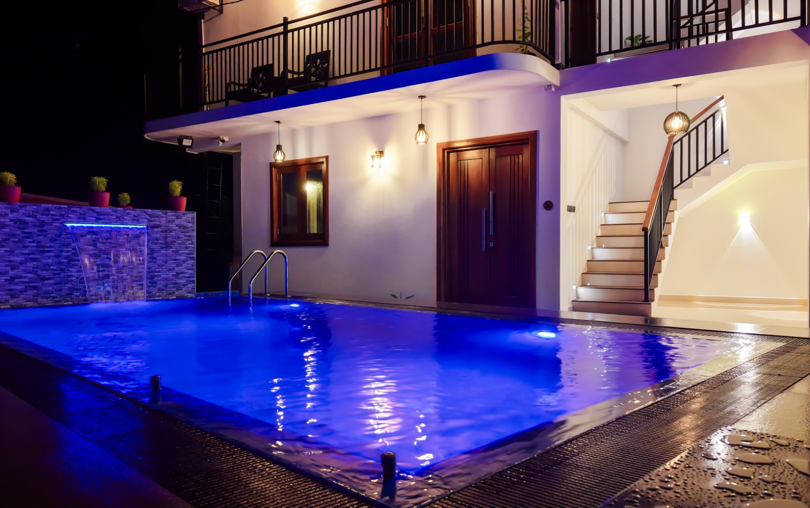 Swimming pool lit at night